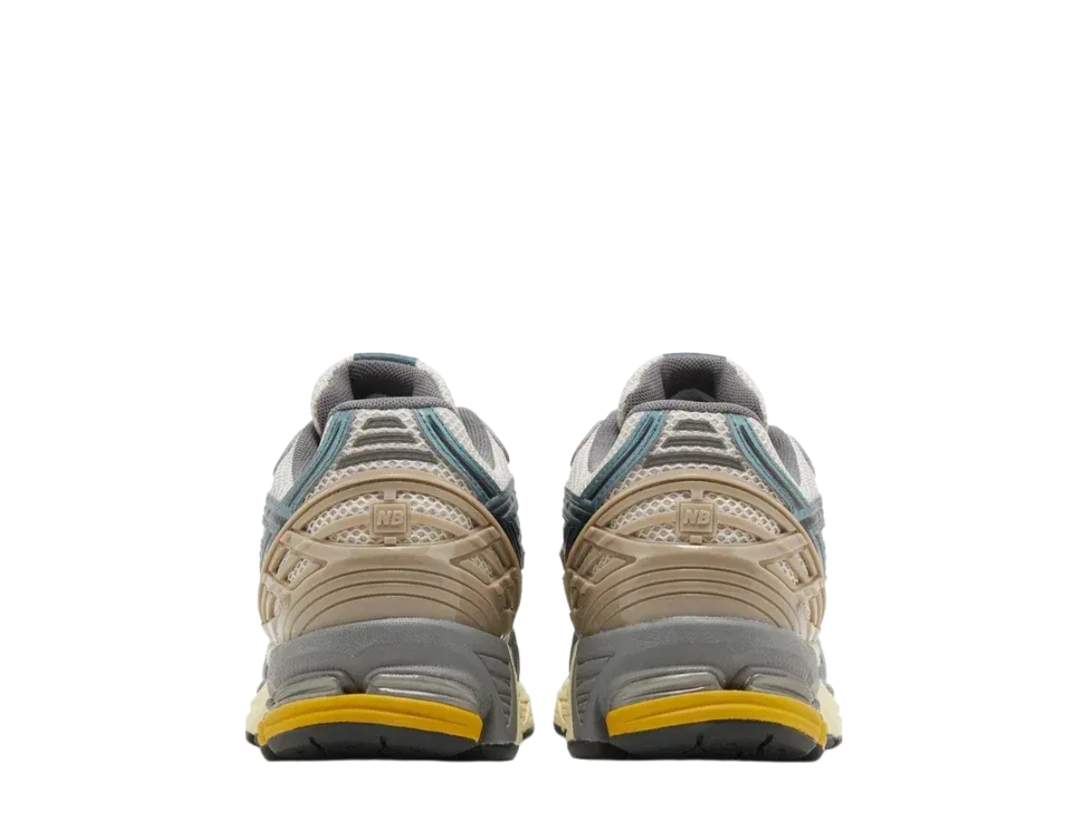 https://d2cva83hdk3bwc.cloudfront.net/new-balance-1906r-metallic-teal-new-spruce-6.jpg