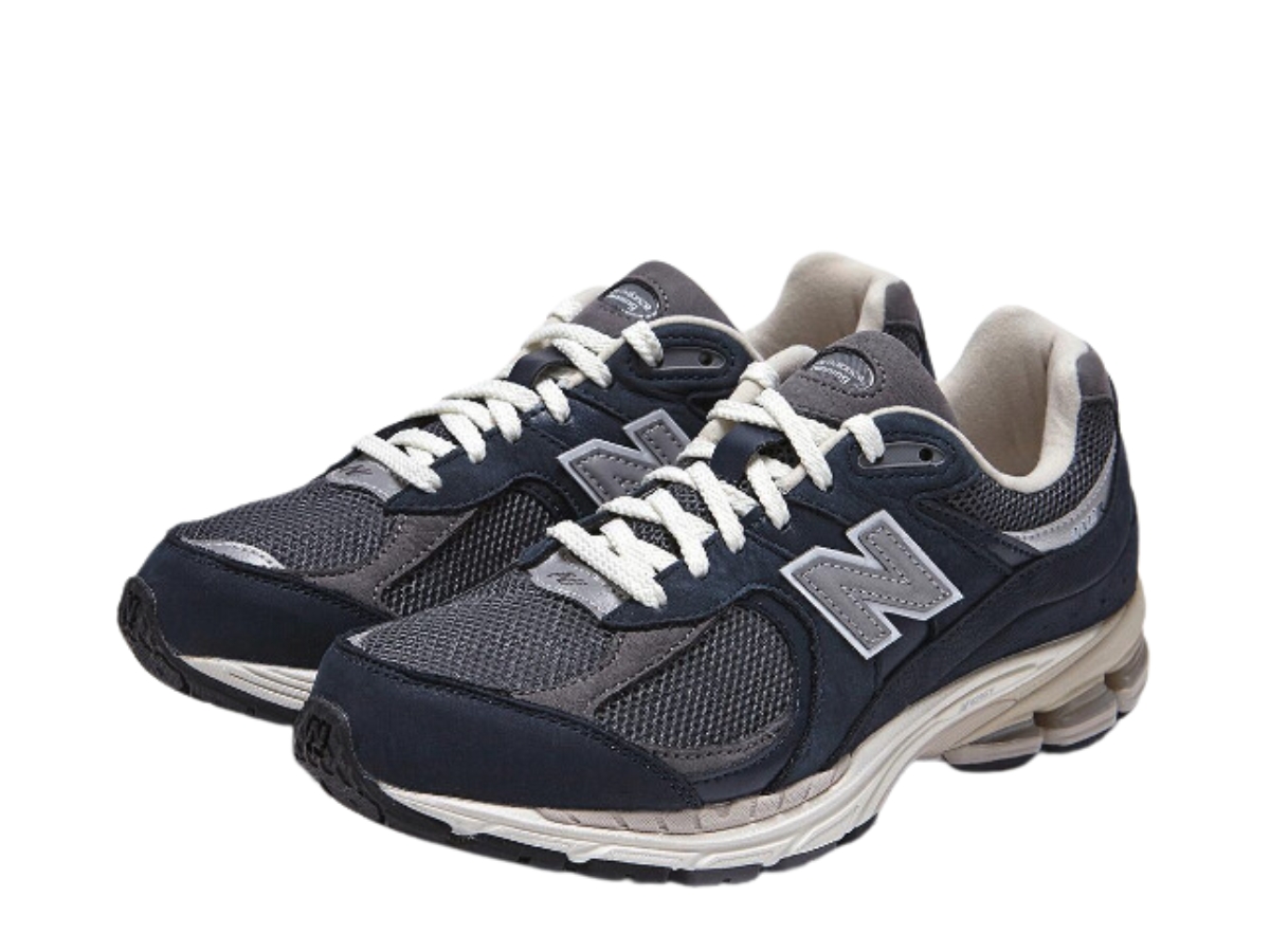 https://d2cva83hdk3bwc.cloudfront.net/new-balance-2002r--premium-vintage-navy-grey-3.jpg