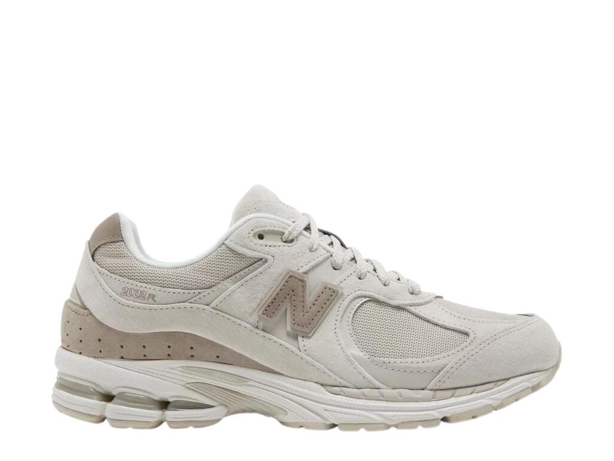 https://d2cva83hdk3bwc.cloudfront.net/new-balance-2002r-light-dark-tan-1.jpg