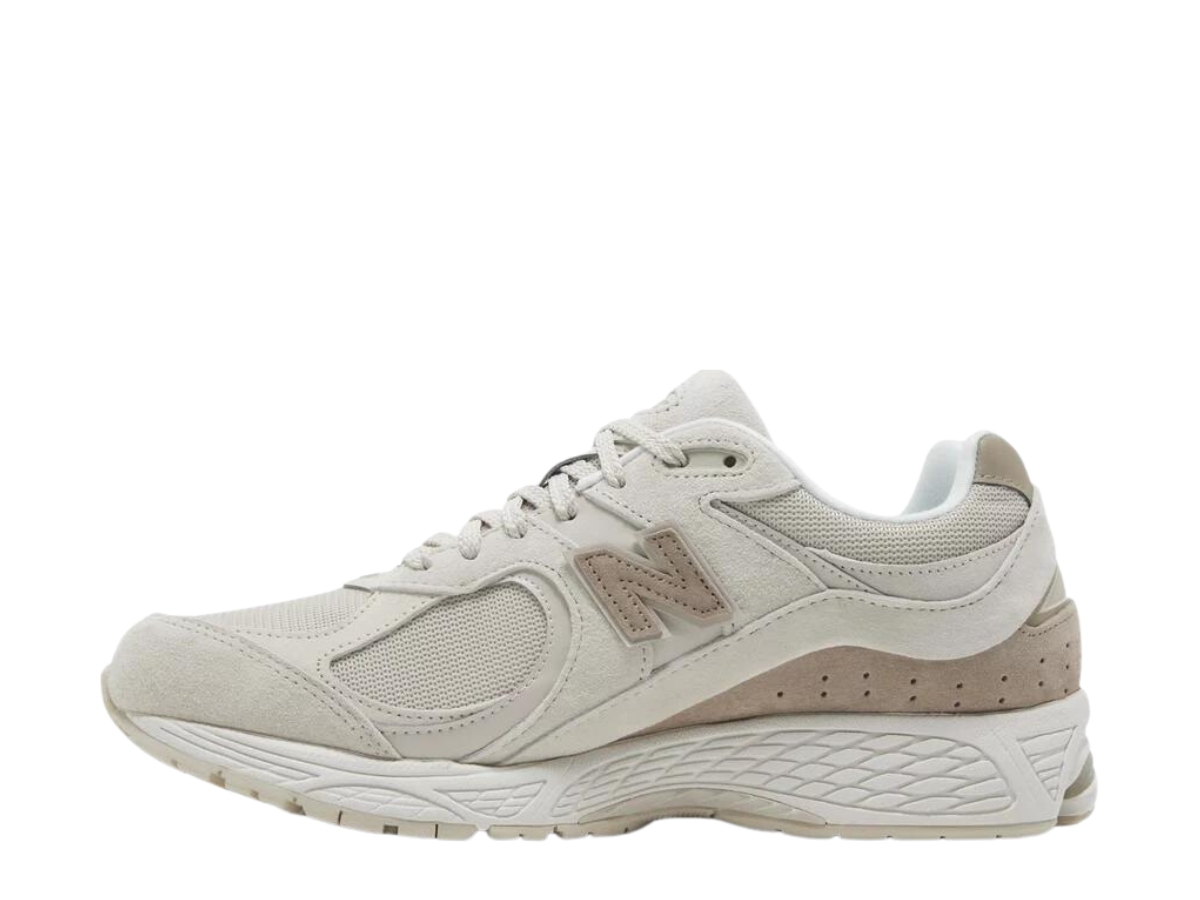 https://d2cva83hdk3bwc.cloudfront.net/new-balance-2002r-light-dark-tan-2.jpg