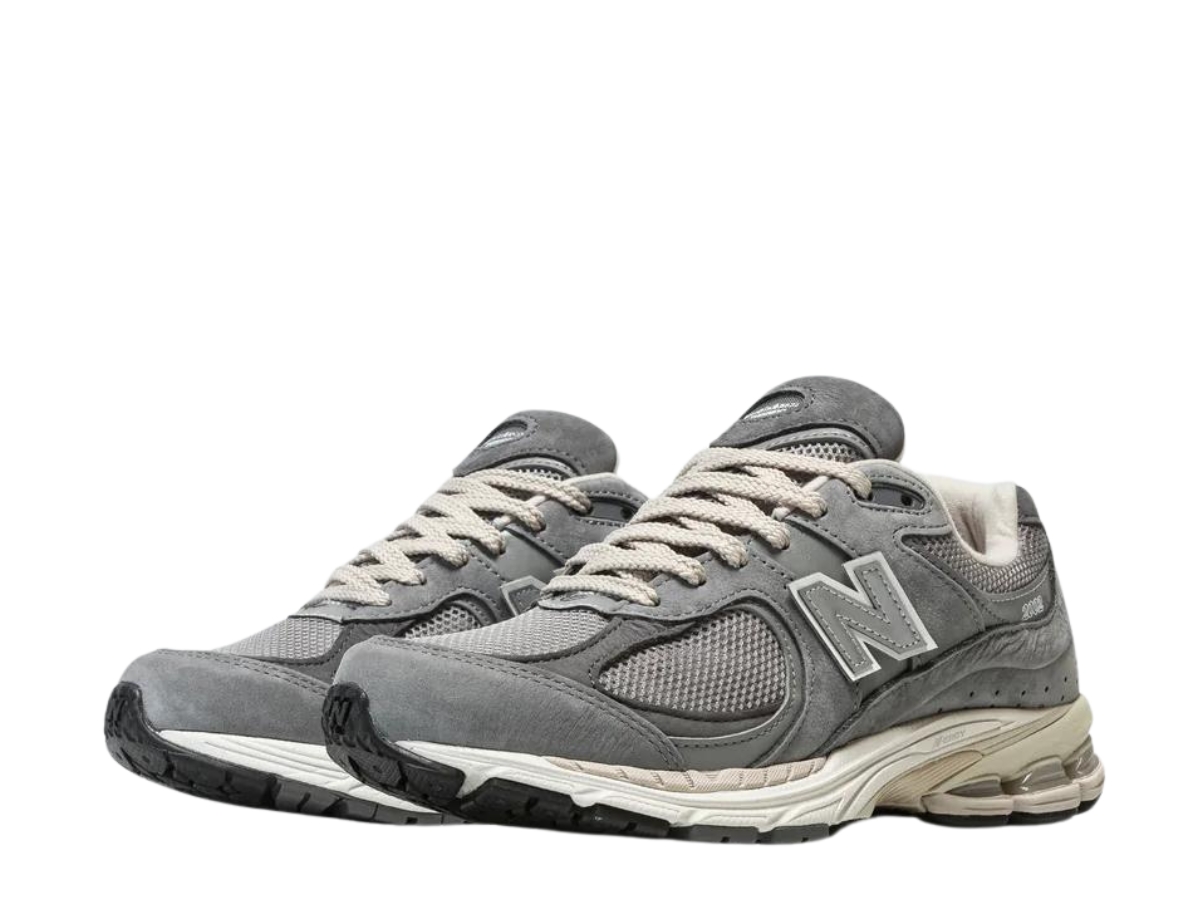 https://d2cva83hdk3bwc.cloudfront.net/new-balance-2002r-premium-vintage-grey-3.jpg