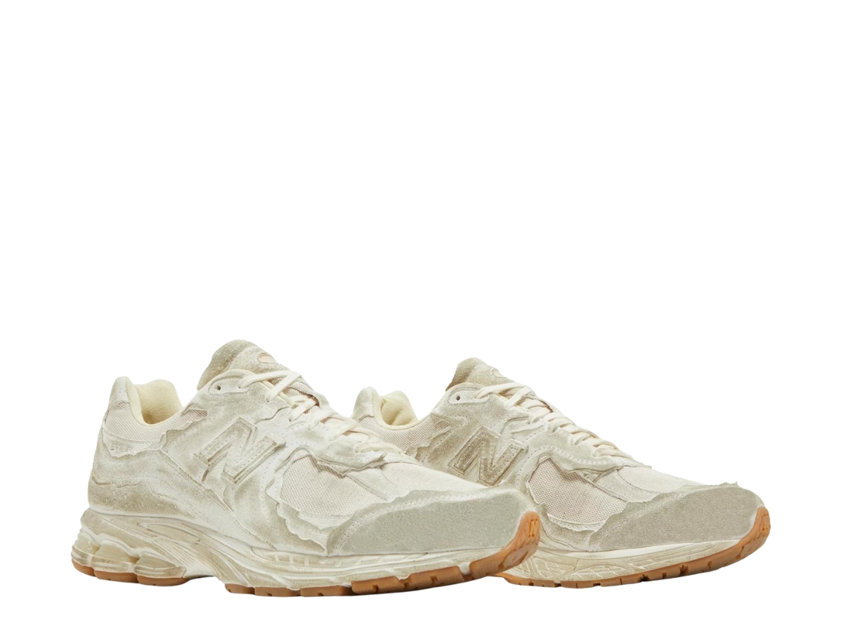 https://d2cva83hdk3bwc.cloudfront.net/new-balance-2002r-protection-pack-distressed-3.jpg