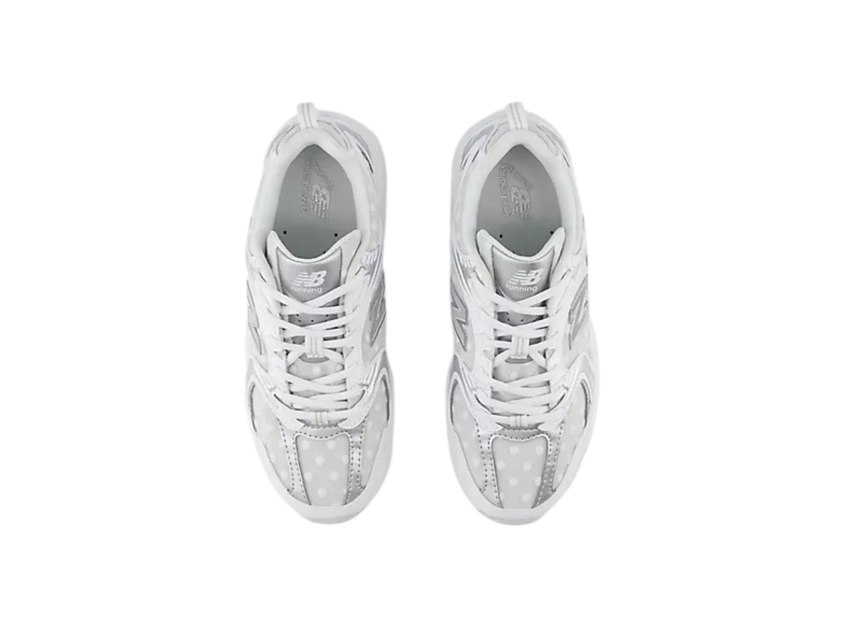 https://d2cva83hdk3bwc.cloudfront.net/new-balance-530-silver-metallic-polka-dots-3.jpg
