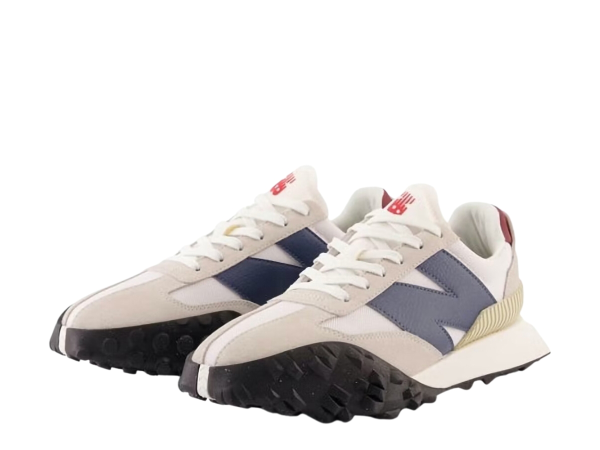 https://d2cva83hdk3bwc.cloudfront.net/new-balance-xc-72-white-navy-3.jpg