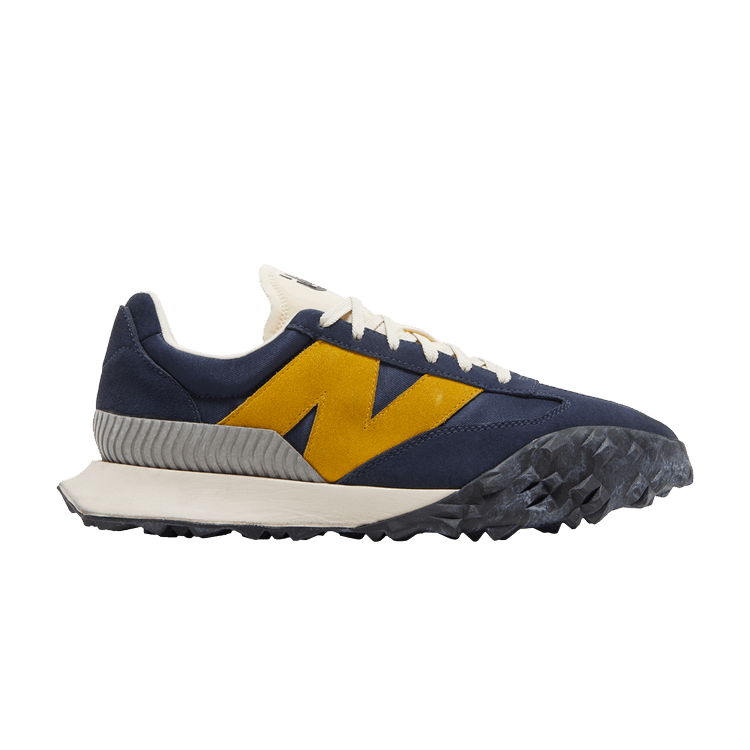 https://d2cva83hdk3bwc.cloudfront.net/new-balance-xc72-navy-varsity-gold-1.jpg