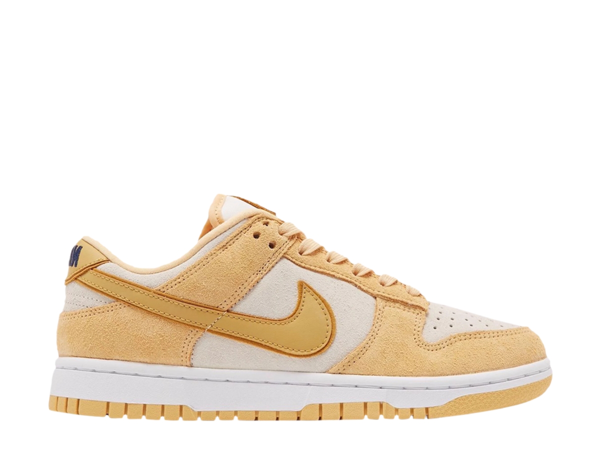 https://d2cva83hdk3bwc.cloudfront.net/nike-dunk-low-gold-suede--w--1.jpg