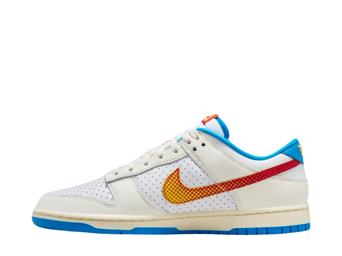 https://d2cva83hdk3bwc.cloudfront.net/nike-dunk-low-retro-se-pop-art-sail-photo-blue-2.jpg