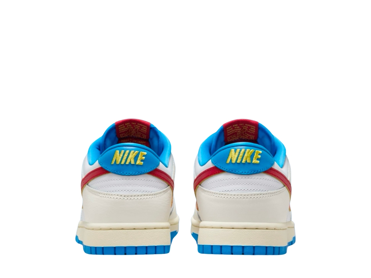 https://d2cva83hdk3bwc.cloudfront.net/nike-dunk-low-retro-se-pop-art-sail-photo-blue-5.jpg