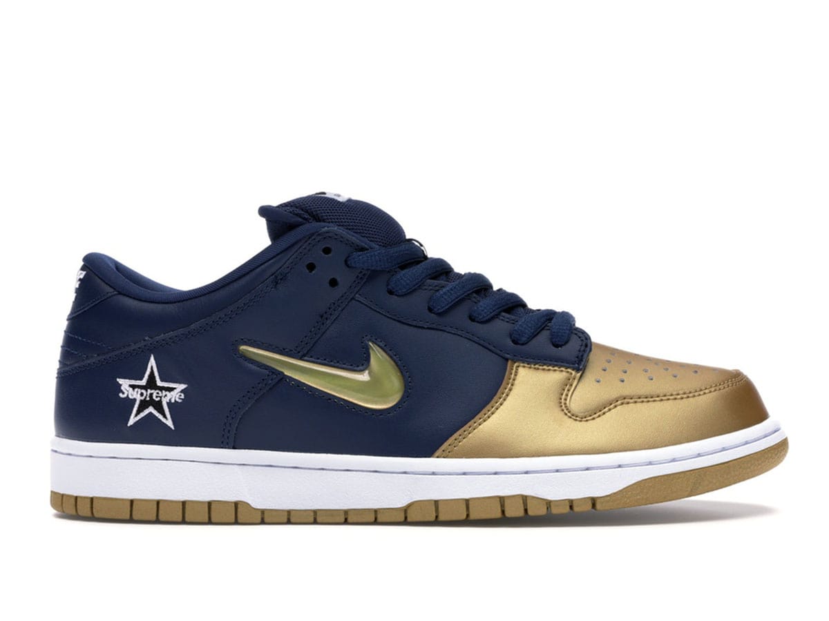 https://d2cva83hdk3bwc.cloudfront.net/nike-sb-dunk-low-supreme-jewel-swoosh-gold-1.jpg