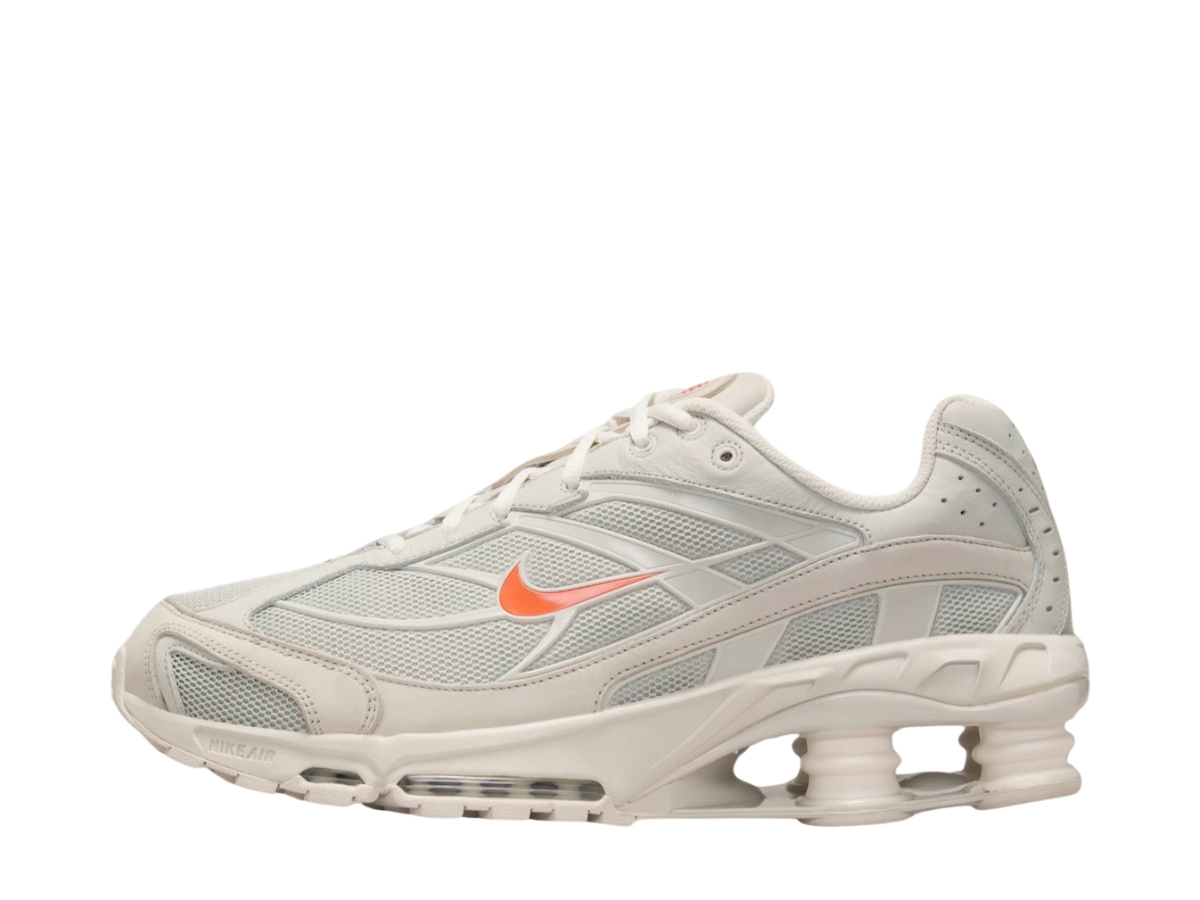 https://d2cva83hdk3bwc.cloudfront.net/nike-shox-ride-2-light-bone-turf-orange-2.jpg