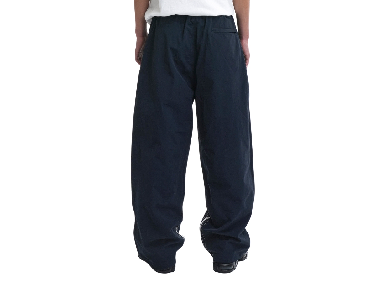 https://d2cva83hdk3bwc.cloudfront.net/oy-w-s-l-tape-track-pants-navy-4.jpg