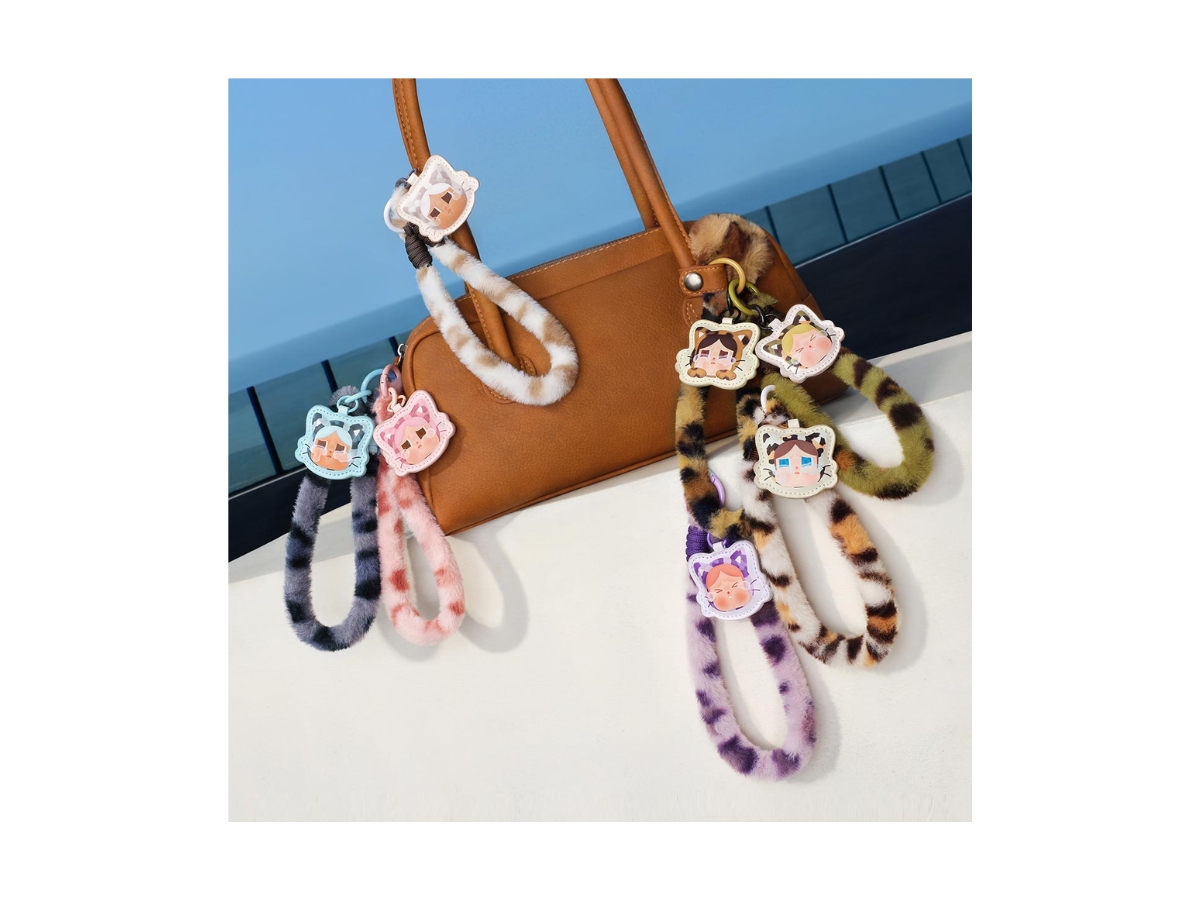 https://d2cva83hdk3bwc.cloudfront.net/pm-bbcpmcccwbcspcbbm-pop-mart-camo-cutie-crybaby-wild-but-cutie-series-phone-charm-blind-box-multicolor-3.jpg