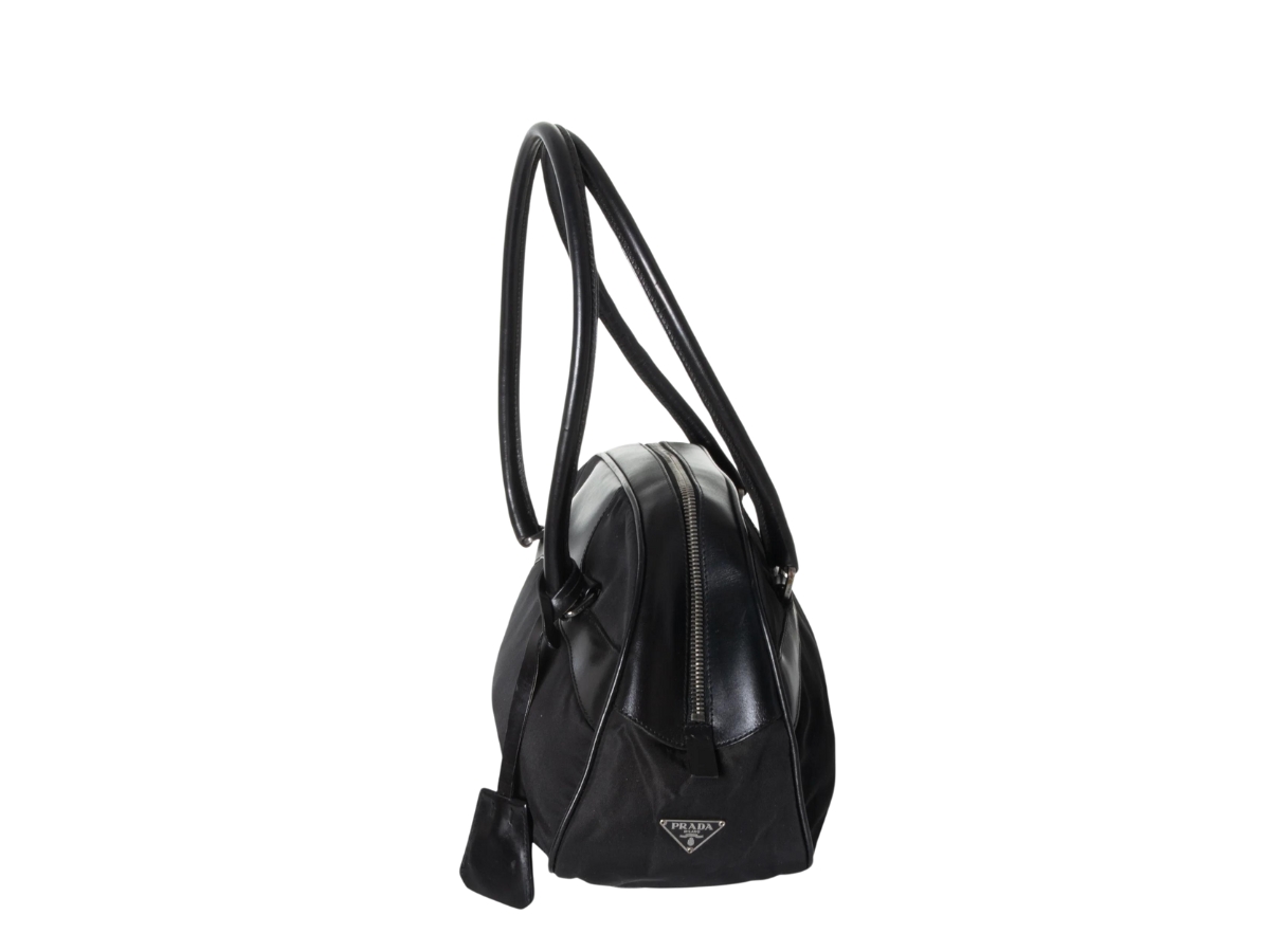 https://d2cva83hdk3bwc.cloudfront.net/prada-bowler-bag-in-nylon-and-calf-leather-with-enameled-metal-triangle-logo-black-5.jpg