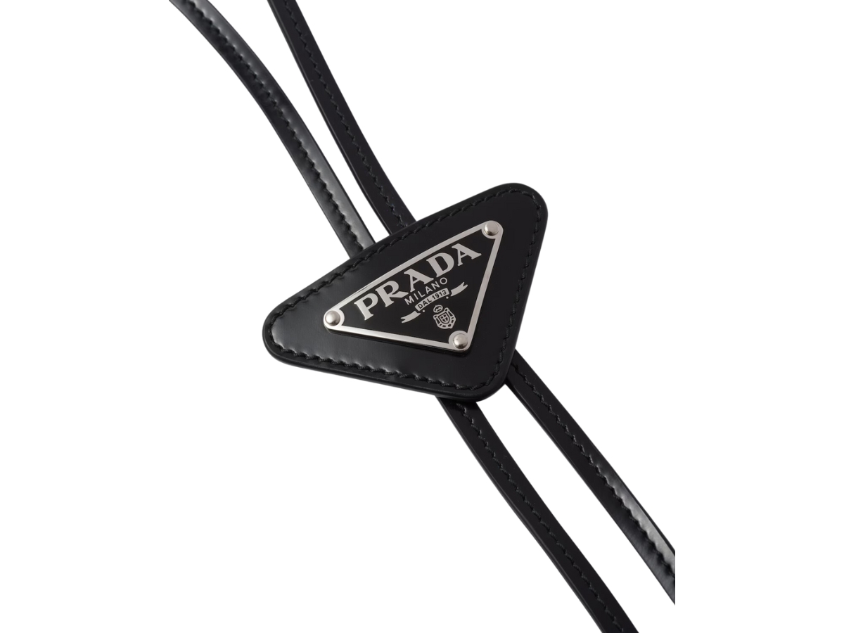 https://d2cva83hdk3bwc.cloudfront.net/prada-brushed-leather-bolo-tie-with-metal-triangle-logo-black-2.jpg