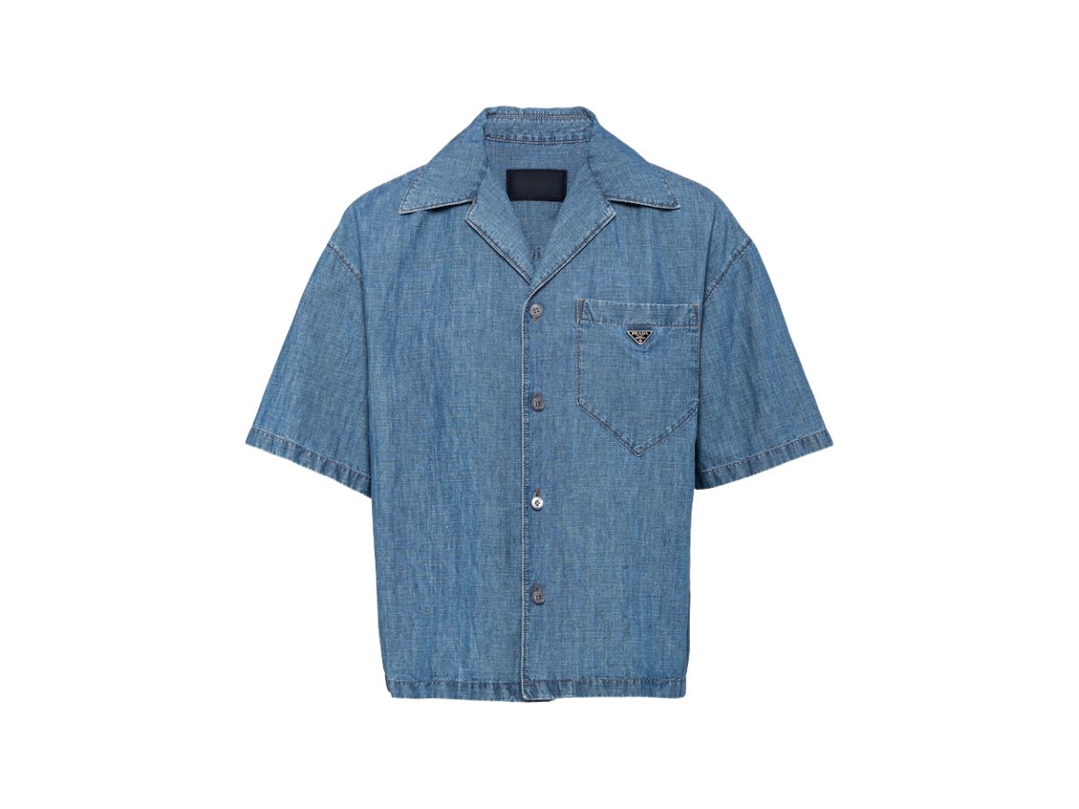 https://d2cva83hdk3bwc.cloudfront.net/prada-chambray-shirt-with-enameled-metal-triangle-logo-light-blue-1.jpg