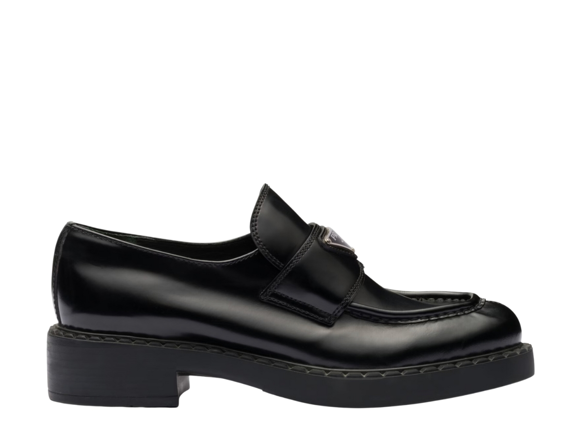 https://d2cva83hdk3bwc.cloudfront.net/prada-chocolate-brushed-leather-loafers-in-rubber-monobloc-sole-with-enameled-metal-triangle-logo-black--w--1.jpg