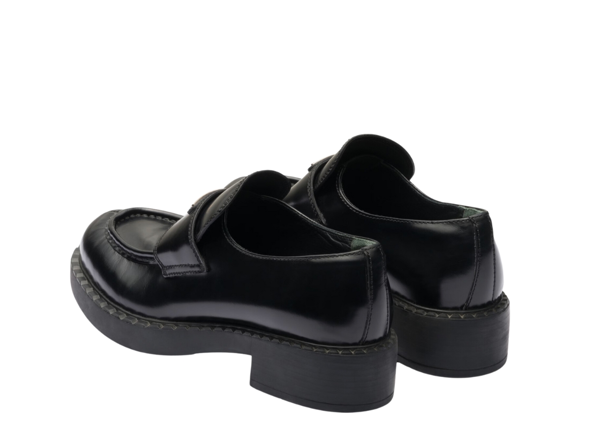 https://d2cva83hdk3bwc.cloudfront.net/prada-chocolate-brushed-leather-loafers-in-rubber-monobloc-sole-with-enameled-metal-triangle-logo-black--w--3.jpg