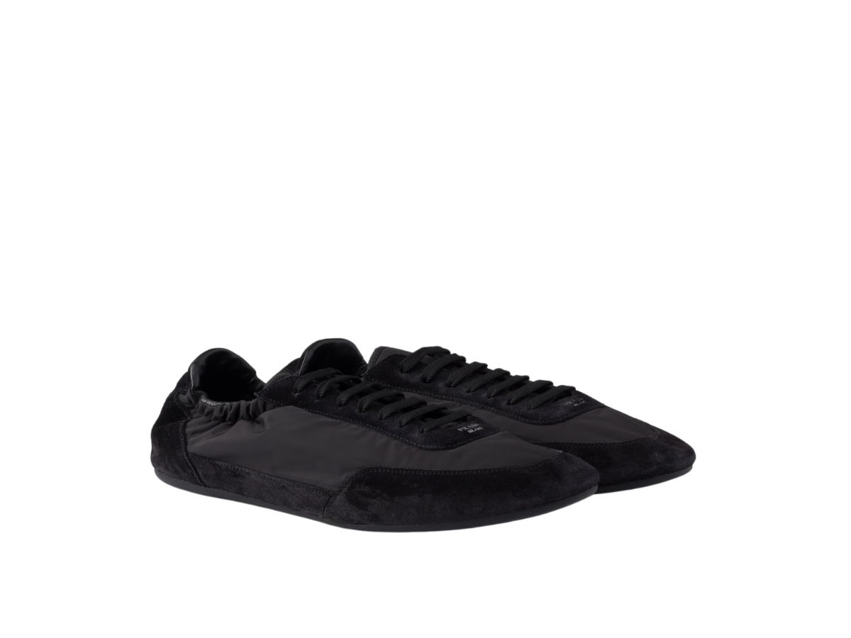 https://d2cva83hdk3bwc.cloudfront.net/prada-collapse-re-nylon-and-suede-elasticized-sneakers-black-2.jpg