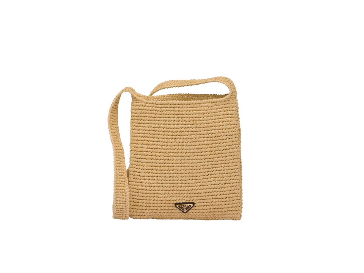 https://d2cva83hdk3bwc.cloudfront.net/prada-crochet-bag-in-raffia-effect-yarn-with-embroidered-lettering-logo-and-enameled-metal-triangle-logo--natural-2.jpg