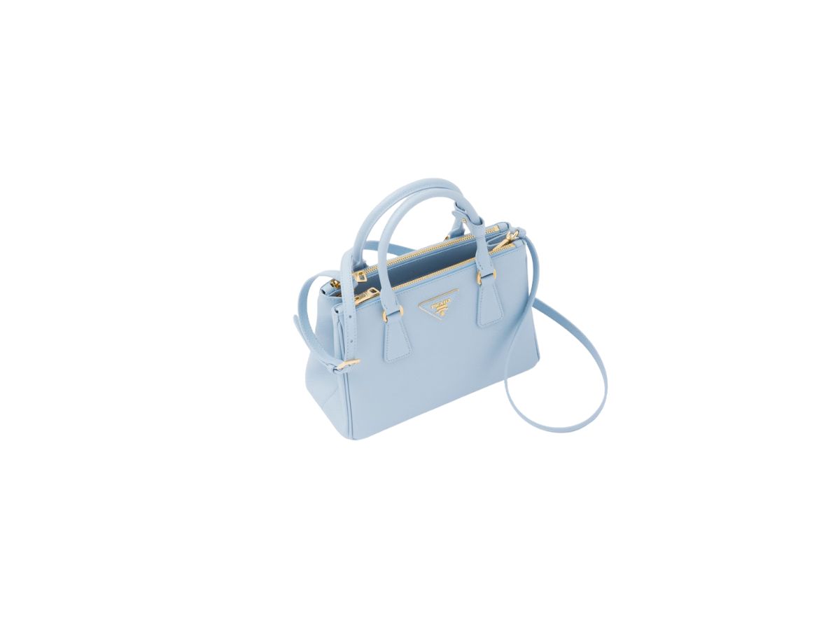 https://d2cva83hdk3bwc.cloudfront.net/prada-medium-prada-galleria-saffiano-leather-bag-with-metal-lettering-logo-light-blue-2.jpg