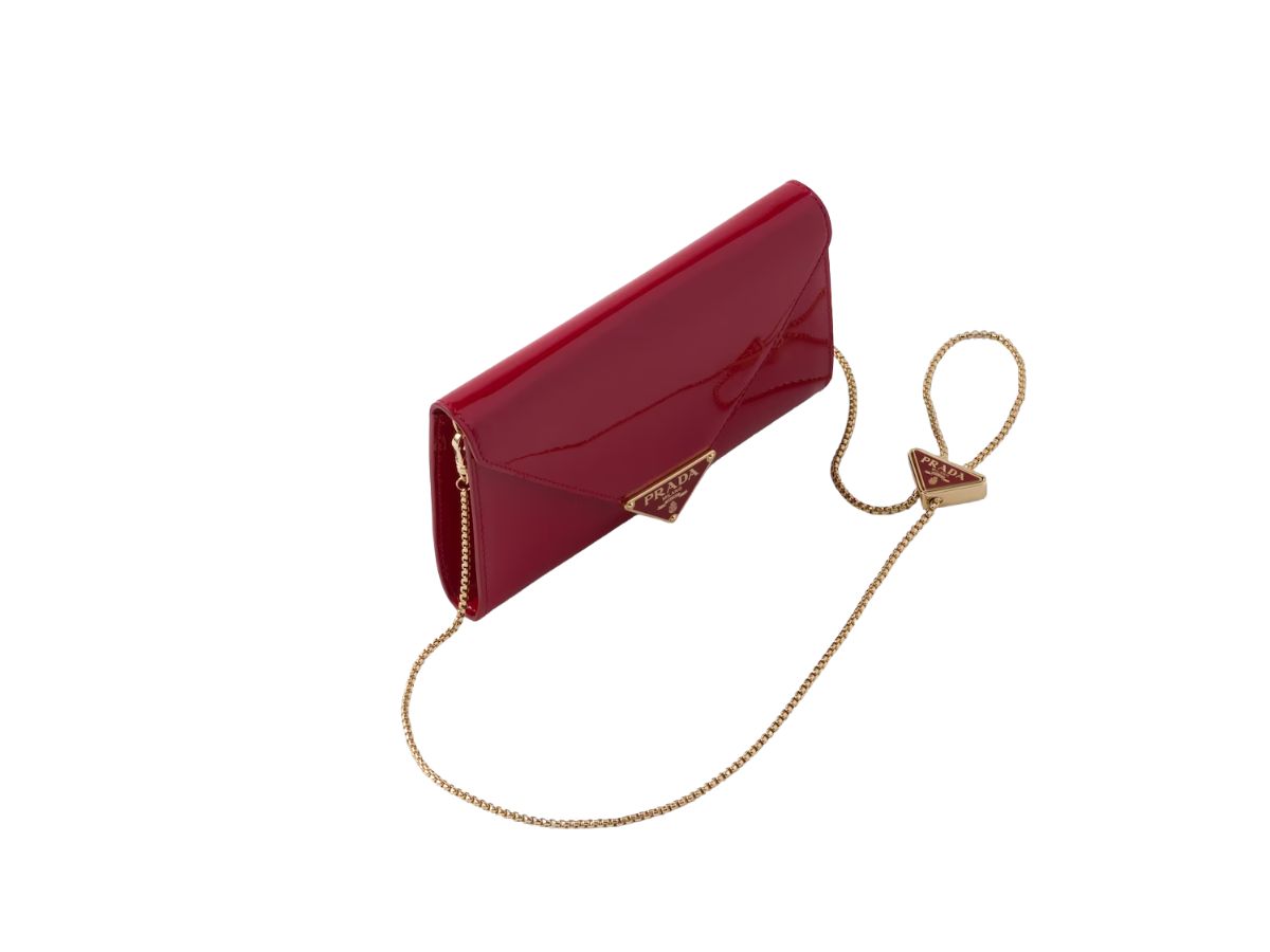https://d2cva83hdk3bwc.cloudfront.net/prada-patent-leather-mini-bag-with-enameled-metal-triangle-logo-and-metal-hardware-red-2.jpg