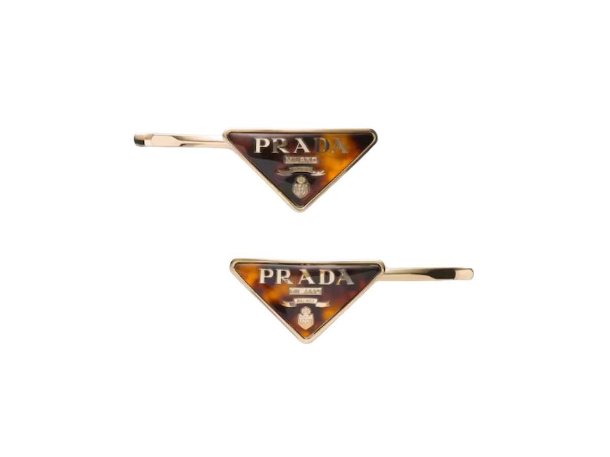 https://d2cva83hdk3bwc.cloudfront.net/prada-plexiglas-and-metal-barrette-honey-tortoiseshell-1.jpg