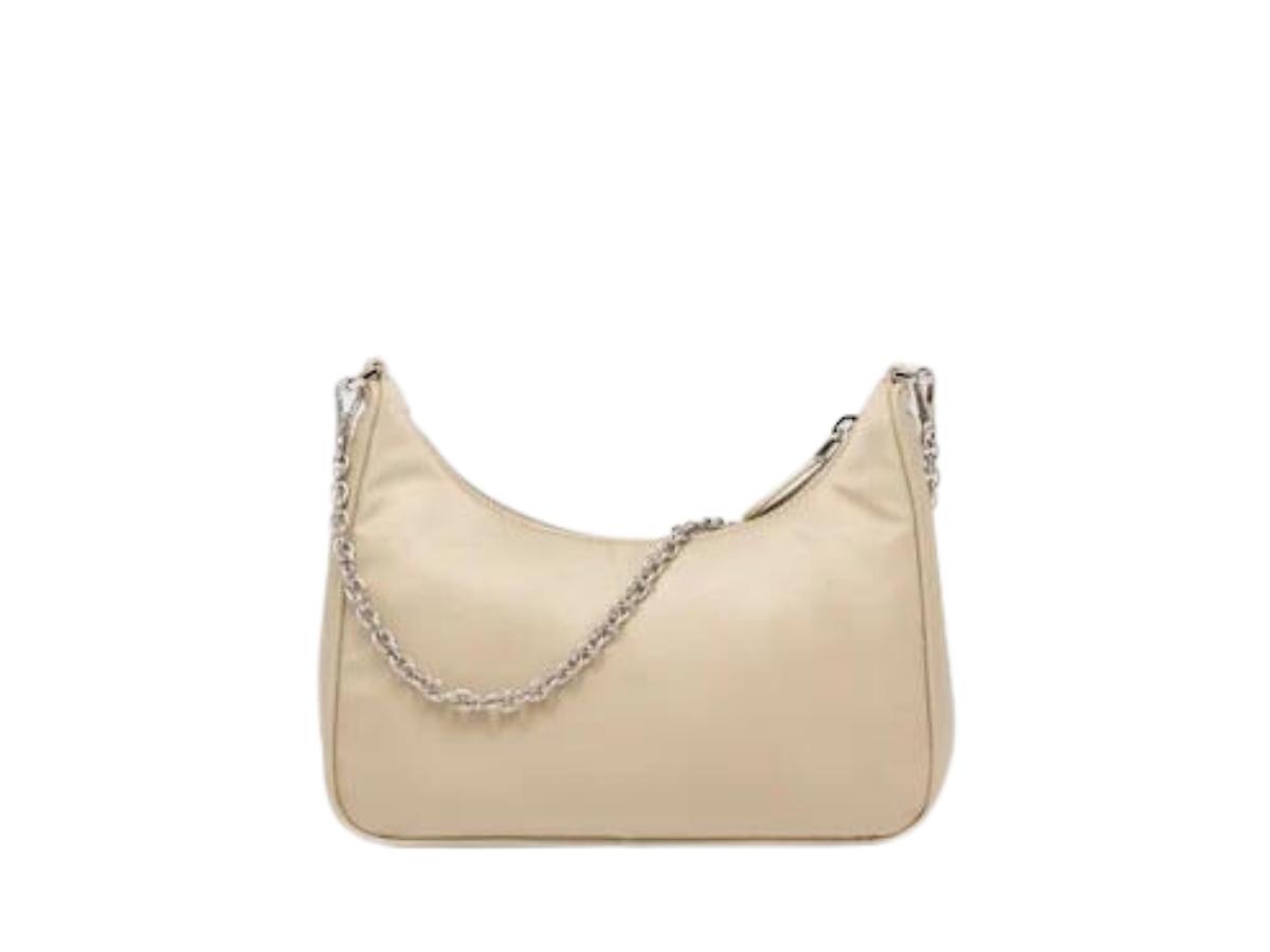 https://d2cva83hdk3bwc.cloudfront.net/prada-re-edition-2005-re-nylon-bag-in-fabric-and-leather-with-metal-hardware-desert-beige-2.jpg
