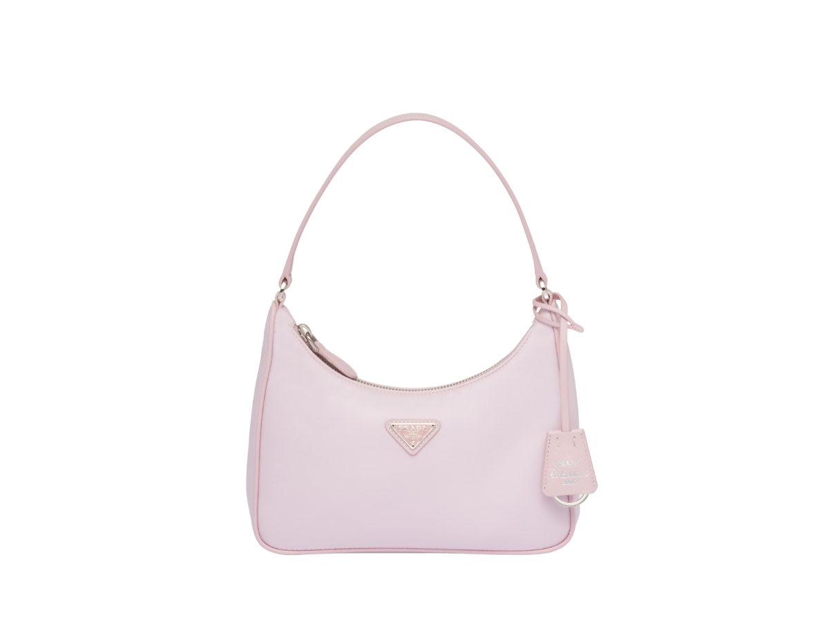 https://d2cva83hdk3bwc.cloudfront.net/prada-re-edition-2005-re-nylon-mini-bag-in-fabric-leather-with-enameled-metal-triangle-logo-alabaster-pink-1.jpg