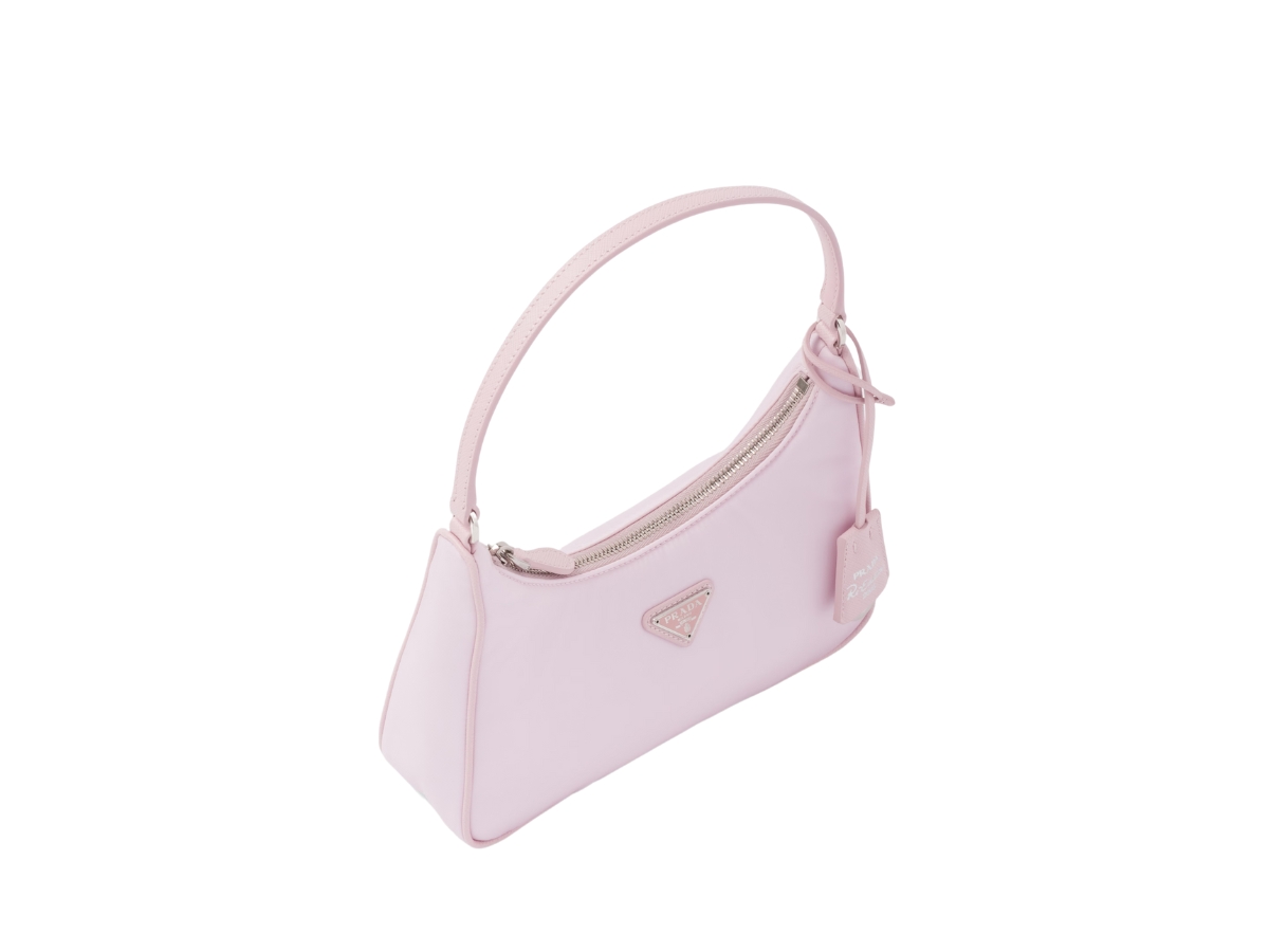 https://d2cva83hdk3bwc.cloudfront.net/prada-re-edition-2005-re-nylon-mini-bag-in-fabric-leather-with-enameled-metal-triangle-logo-alabaster-pink-3.jpg