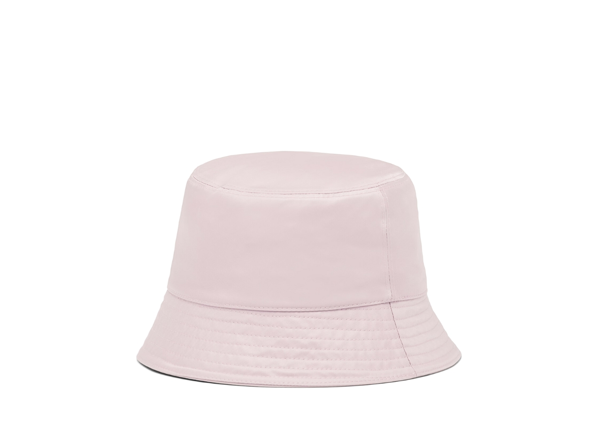 https://d2cva83hdk3bwc.cloudfront.net/prada-re-nylon-bucket-hat-in-cotton-lining-with-enameled-metal-triangle-logo-alabaster-pink-2.jpg