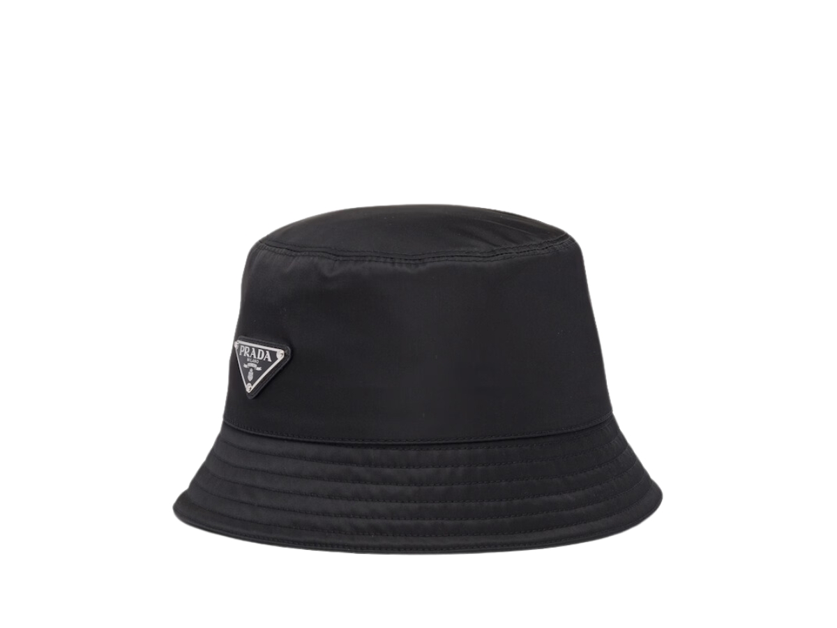 https://d2cva83hdk3bwc.cloudfront.net/prada-re-nylon-bucket-hat-in-cotton-lining-with-enameled-metal-triangle-logo-black-1.jpg
