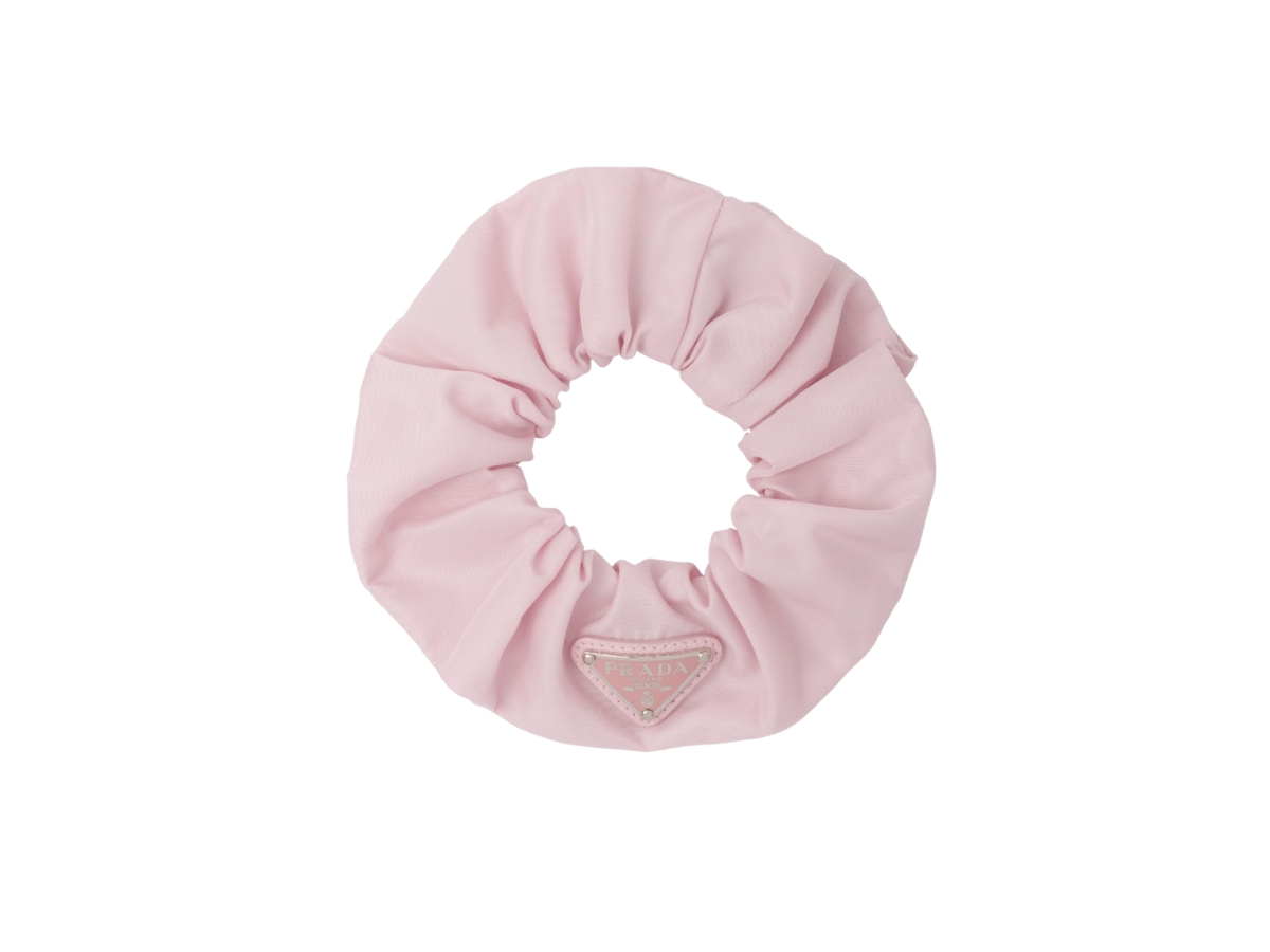 https://d2cva83hdk3bwc.cloudfront.net/prada-re-nylon-scrunchie-with-enameled-metal-triangle-logo-alabaster-pink-1.jpg