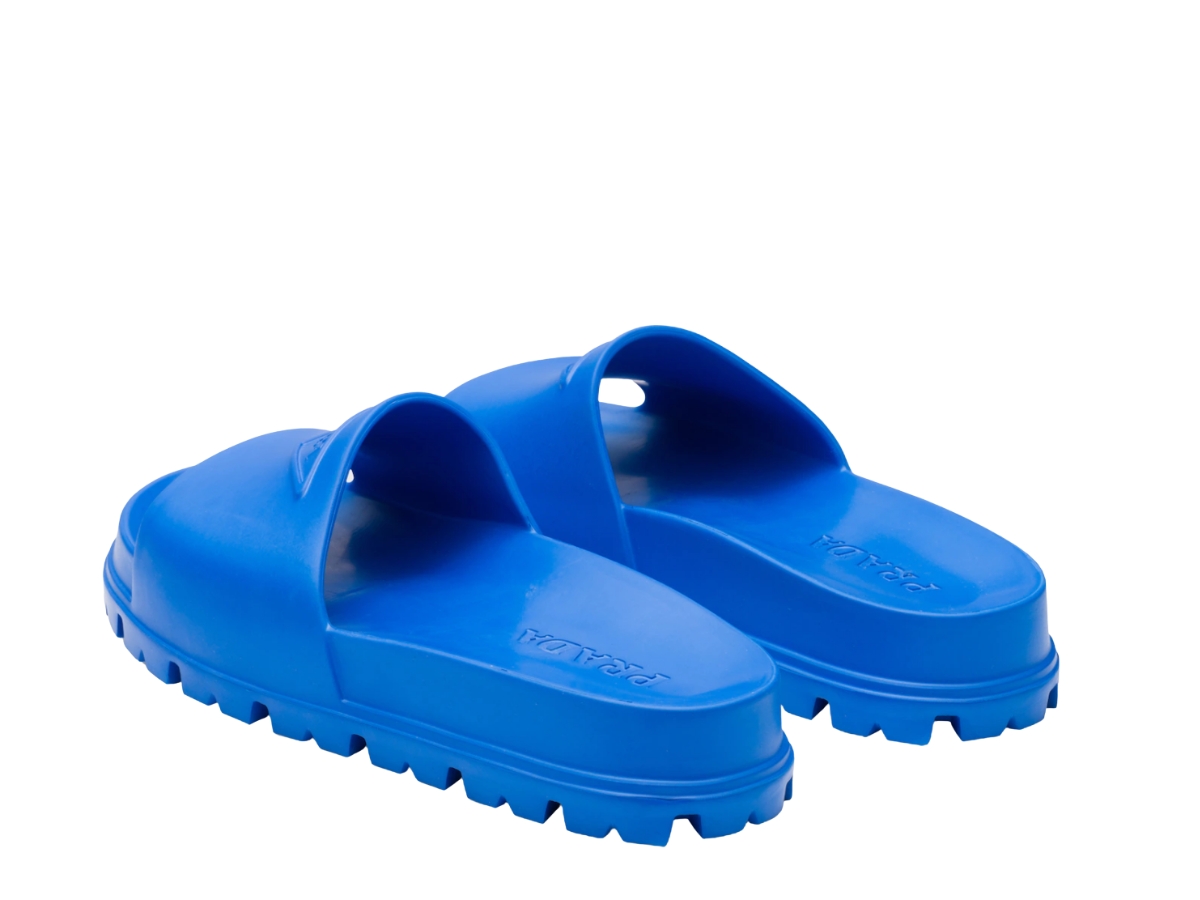 https://d2cva83hdk3bwc.cloudfront.net/prada-rubber-slides-sapphire-blue-2.jpg