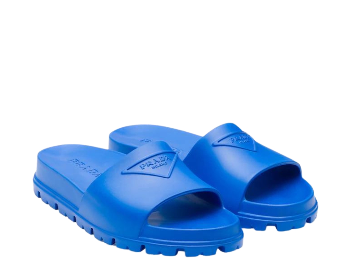 https://d2cva83hdk3bwc.cloudfront.net/prada-rubber-slides-sapphire-blue-3.jpg