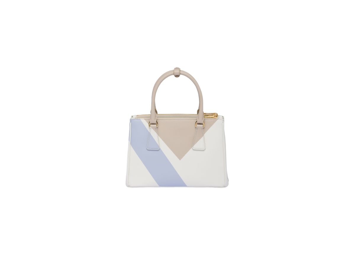 https://d2cva83hdk3bwc.cloudfront.net/prada-small-prada-galleria-saffiano-special-edition-bag-with-enameled-metal-triangle-logo-desert-white-3.jpg