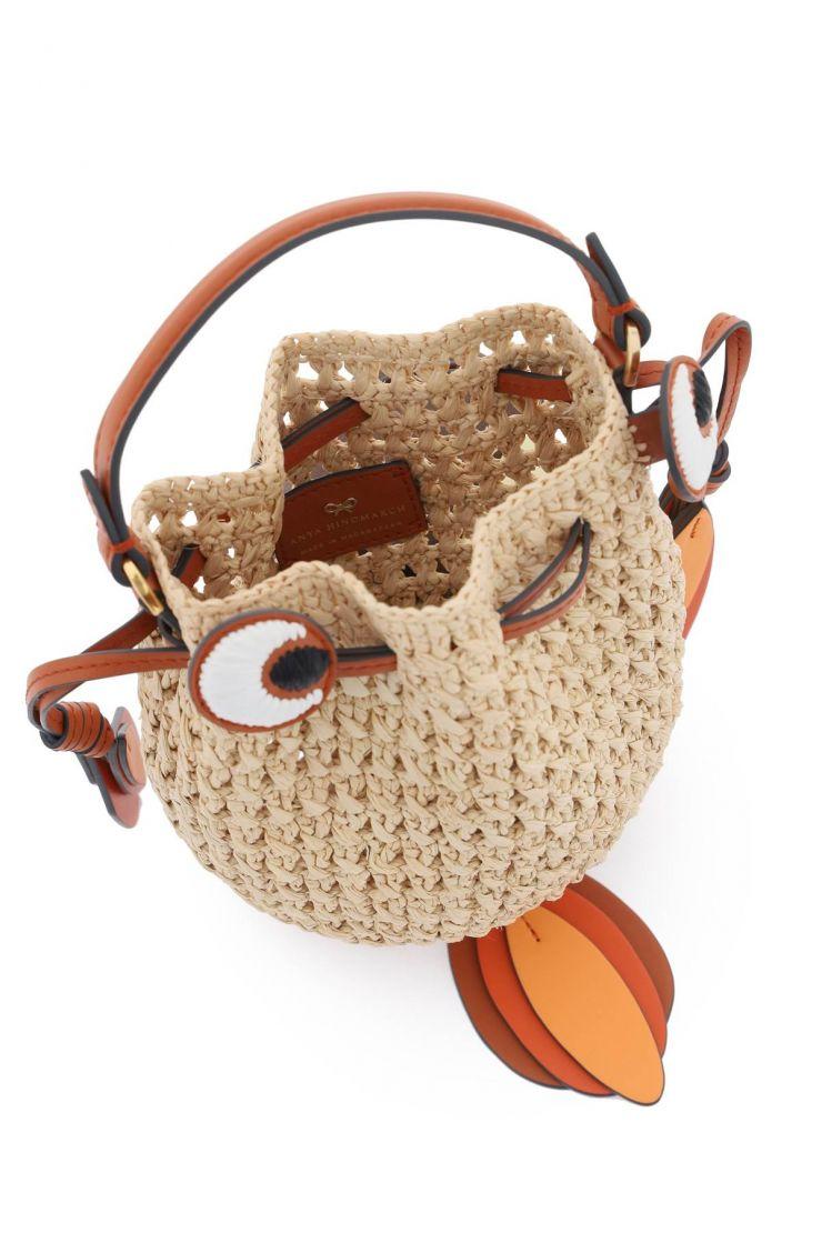 https://d2cva83hdk3bwc.cloudfront.net/raffia-gold-fish-handbag-anya-hindmarch-orangeneutro-2.jpg
