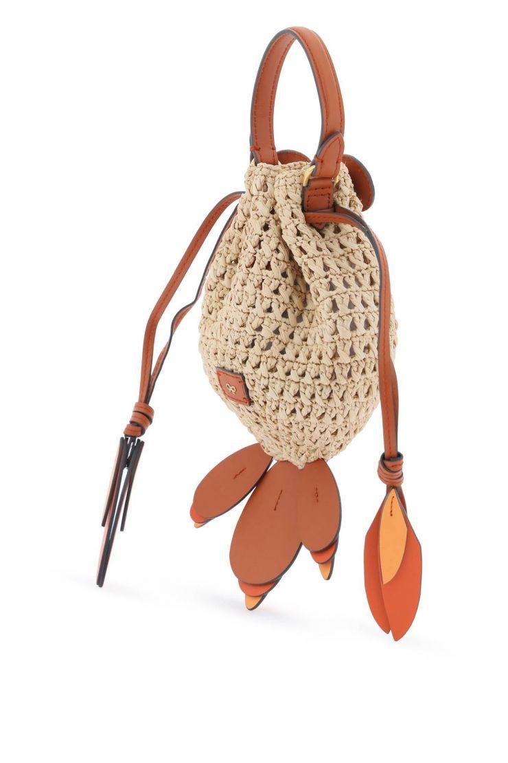 https://d2cva83hdk3bwc.cloudfront.net/raffia-gold-fish-handbag-anya-hindmarch-orangeneutro-3.jpg