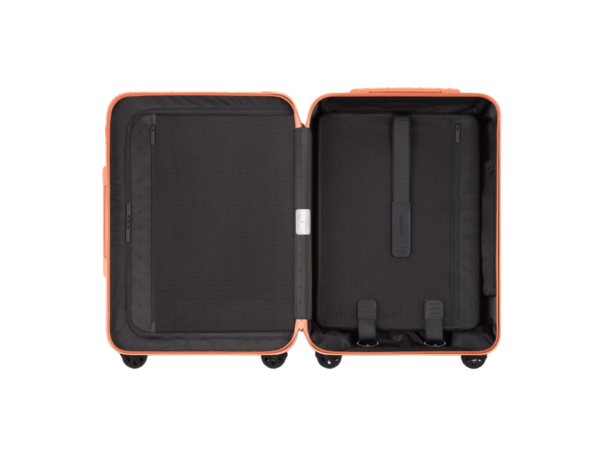 https://d2cva83hdk3bwc.cloudfront.net/rimowa-cabin-carry-on-gloss-papaya-orange-5.jpg