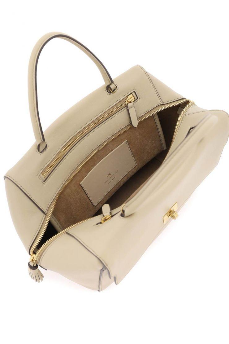 https://d2cva83hdk3bwc.cloudfront.net/seaton-handbag-anya-hindmarch-beige-2.jpg