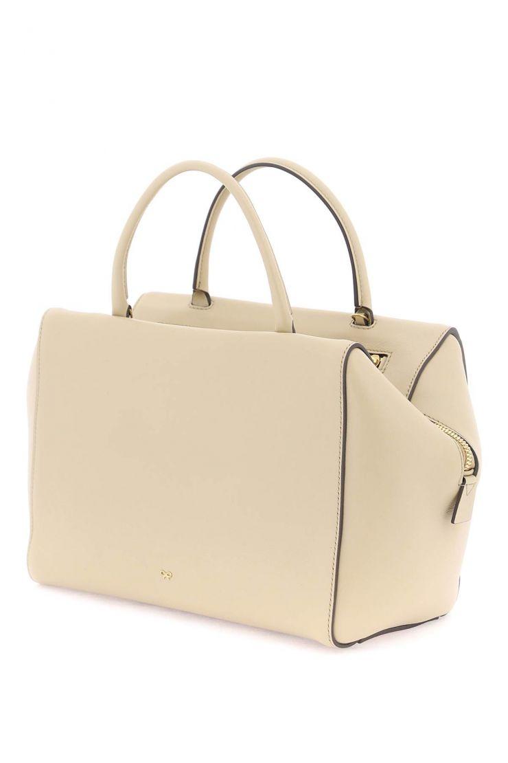 https://d2cva83hdk3bwc.cloudfront.net/seaton-handbag-anya-hindmarch-beige-3.jpg