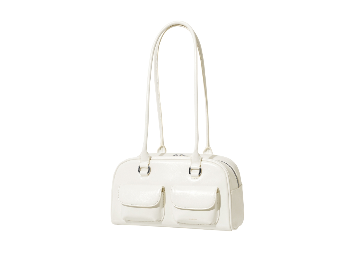 https://d2cva83hdk3bwc.cloudfront.net/stand-oil-chubby-bag-in-vegan-leather-with-silver-hardware-white-2.jpg