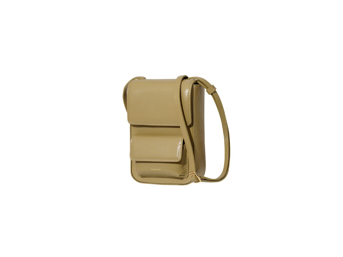 https://d2cva83hdk3bwc.cloudfront.net/stand-oil-chubby-cross-bag-in-vegan-leather-mud-2.jpg
