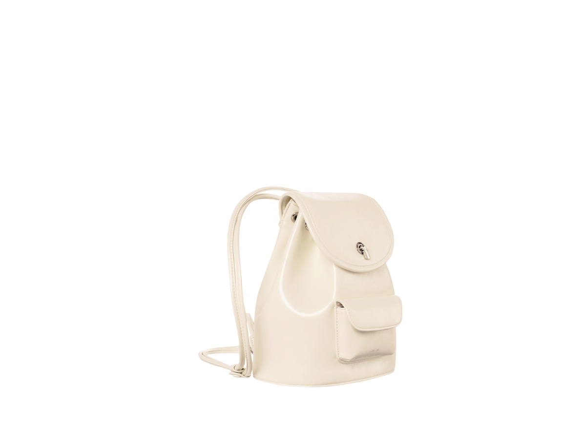 https://d2cva83hdk3bwc.cloudfront.net/stand-oil-mini-ditto-backpack-in-glossy-and-soft-touch-materials-cream-2.jpg