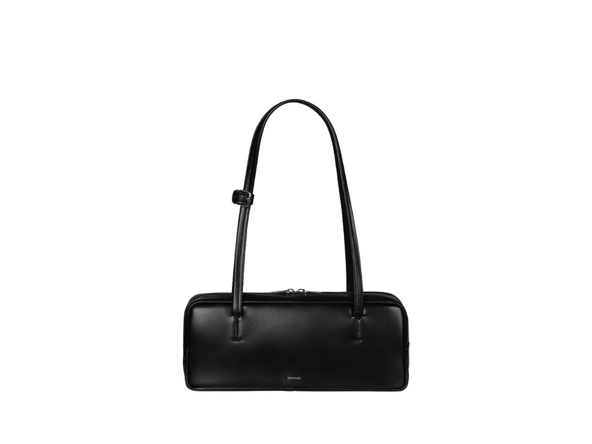 https://d2cva83hdk3bwc.cloudfront.net/stand-oil-more-baguette-bag-in-vegan-leather-black-1.jpg