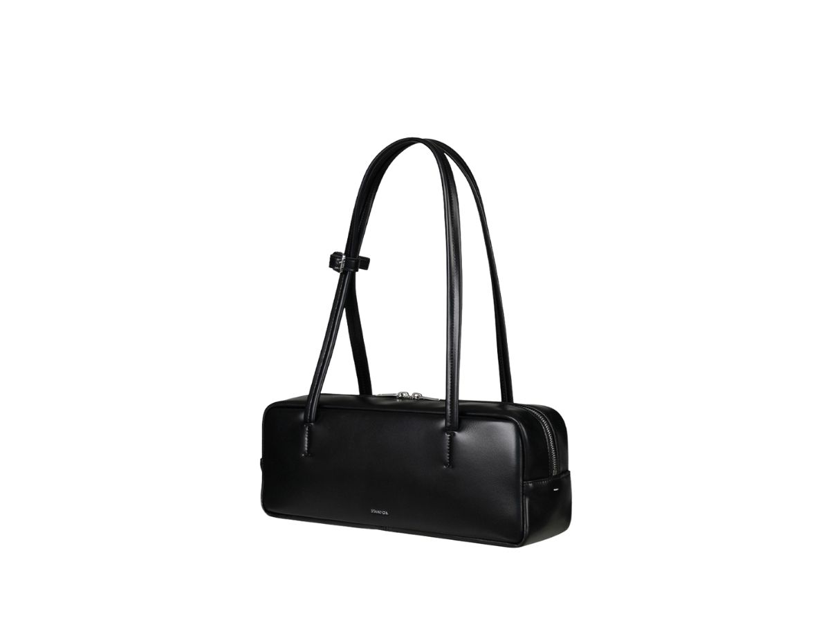 https://d2cva83hdk3bwc.cloudfront.net/stand-oil-more-baguette-bag-in-vegan-leather-black-2.jpg