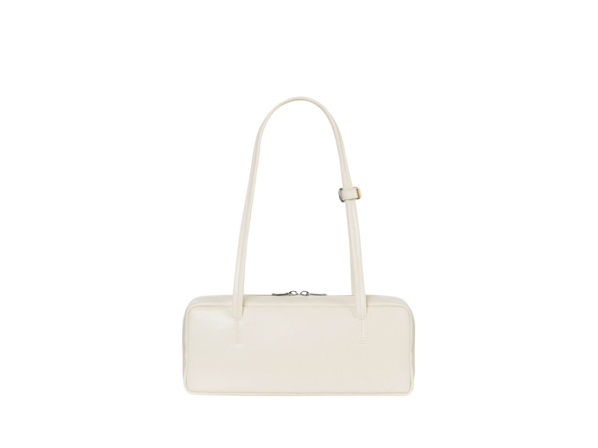 https://d2cva83hdk3bwc.cloudfront.net/stand-oil-more-baguette-bag-in-vegan-leather-cream-3.jpg