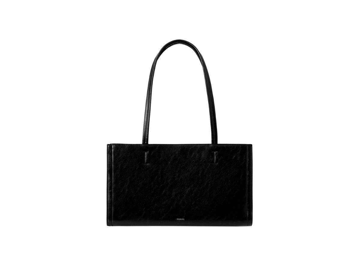 https://d2cva83hdk3bwc.cloudfront.net/stand-oil-oblong-bag-in-vegan-leather-black-1.jpg