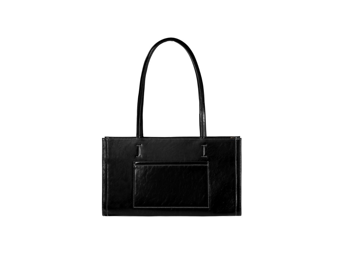 https://d2cva83hdk3bwc.cloudfront.net/stand-oil-oblong-bag-in-vegan-leather-stitch-black-2.jpg