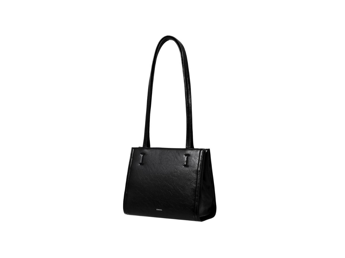 https://d2cva83hdk3bwc.cloudfront.net/stand-oil-oblong-bag-mini-in-vegan-leather-black-2.jpg