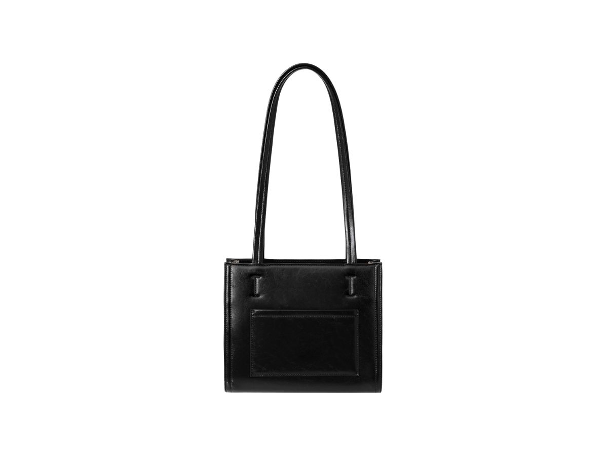 https://d2cva83hdk3bwc.cloudfront.net/stand-oil-oblong-bag-mini-in-vegan-leather-black-3.jpg